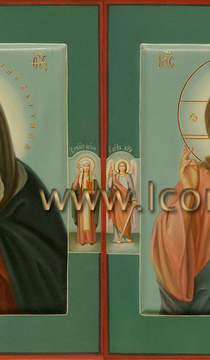 Фото: Венчальная пара с иконой Божией Матери «Умиление»