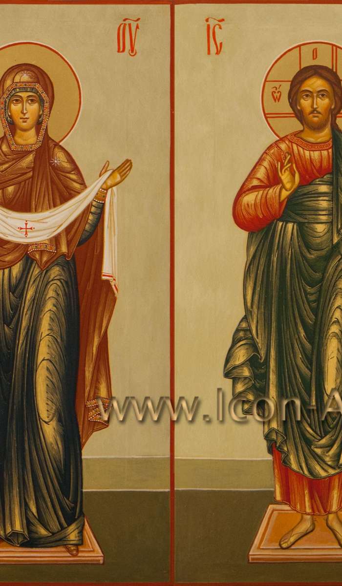 Фото: Венчальная пара с иконой Пресвятой Богородицы «Покров»