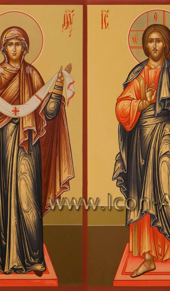 Фото: Венчальная пара с иконой Пресвятой Богородицы «Покров»