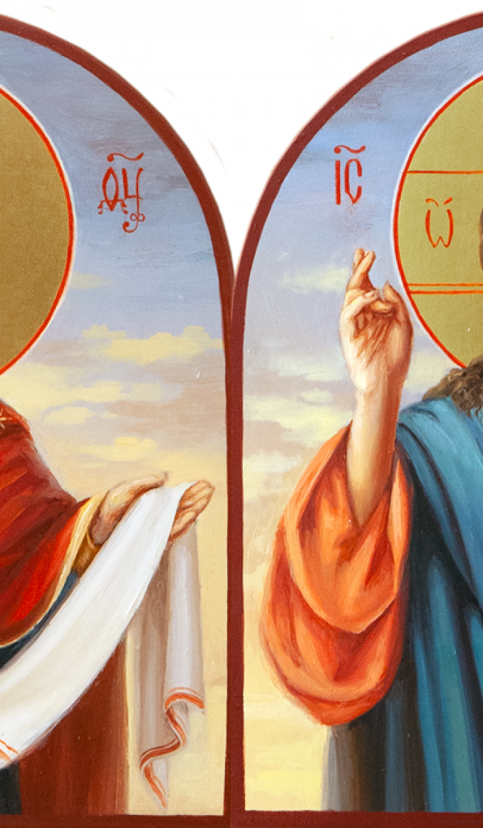 Фото: Венчальная пара с иконой Богородицы «Покров»