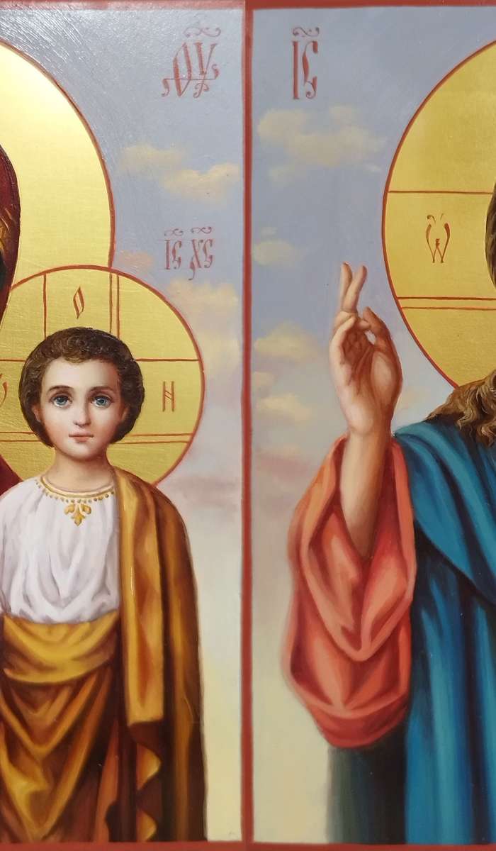 Фото: Венчальная пара с иконой Богороидцы "Казанская"